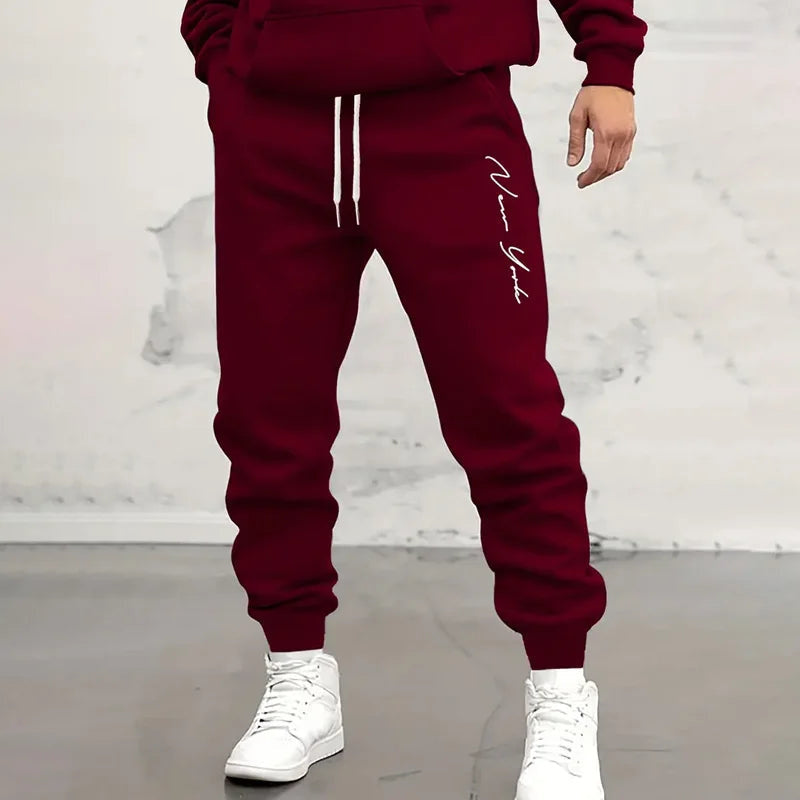 Jogginghose Herren mit Kordelzug und seitlichem Schriftzug - Rot #Farbe_Rot
