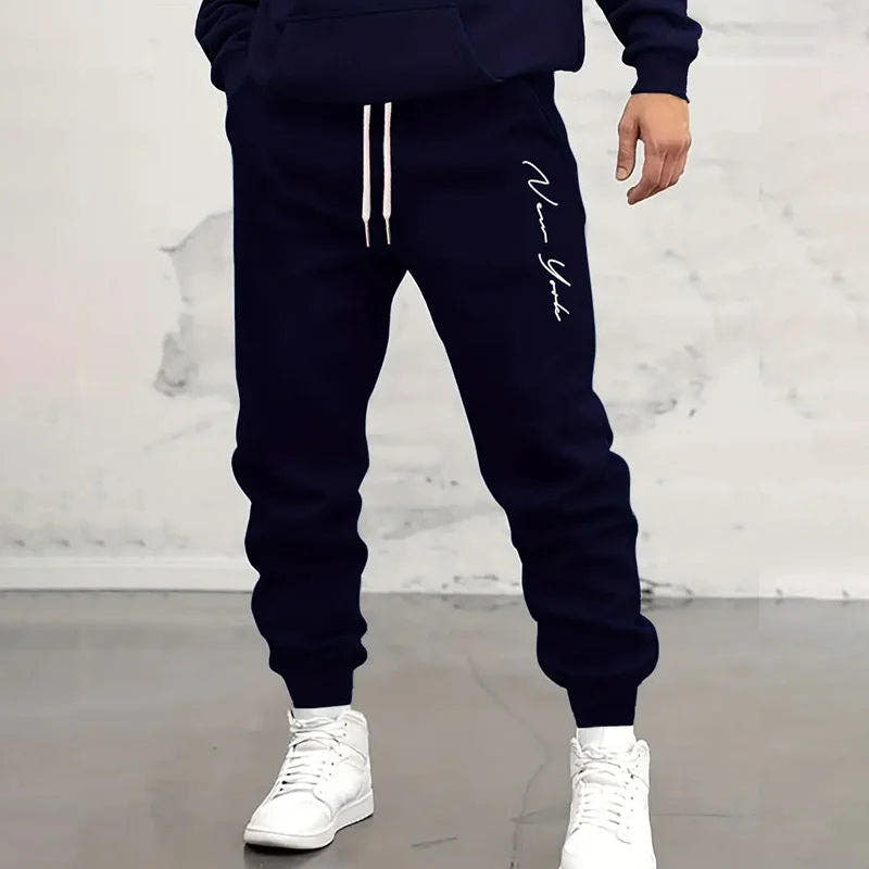 Jogginghose Herren mit Kordelzug und seitlichem Schriftzug - Marineblau #Farbe_Marineblau